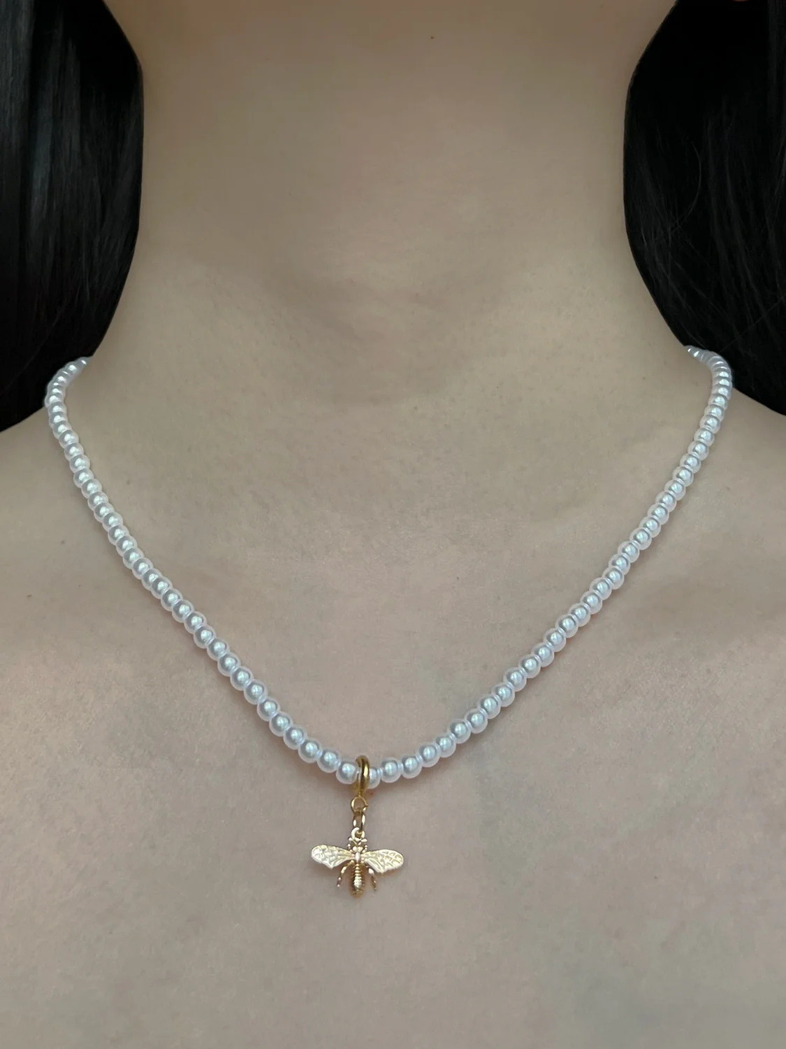 Tiny Pearl Necklace with Bee Charm - Image 2